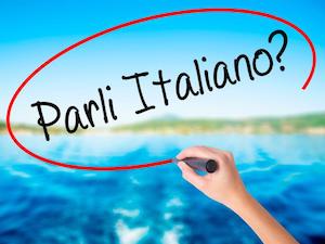 Woman writing: "Parli Italiano?"