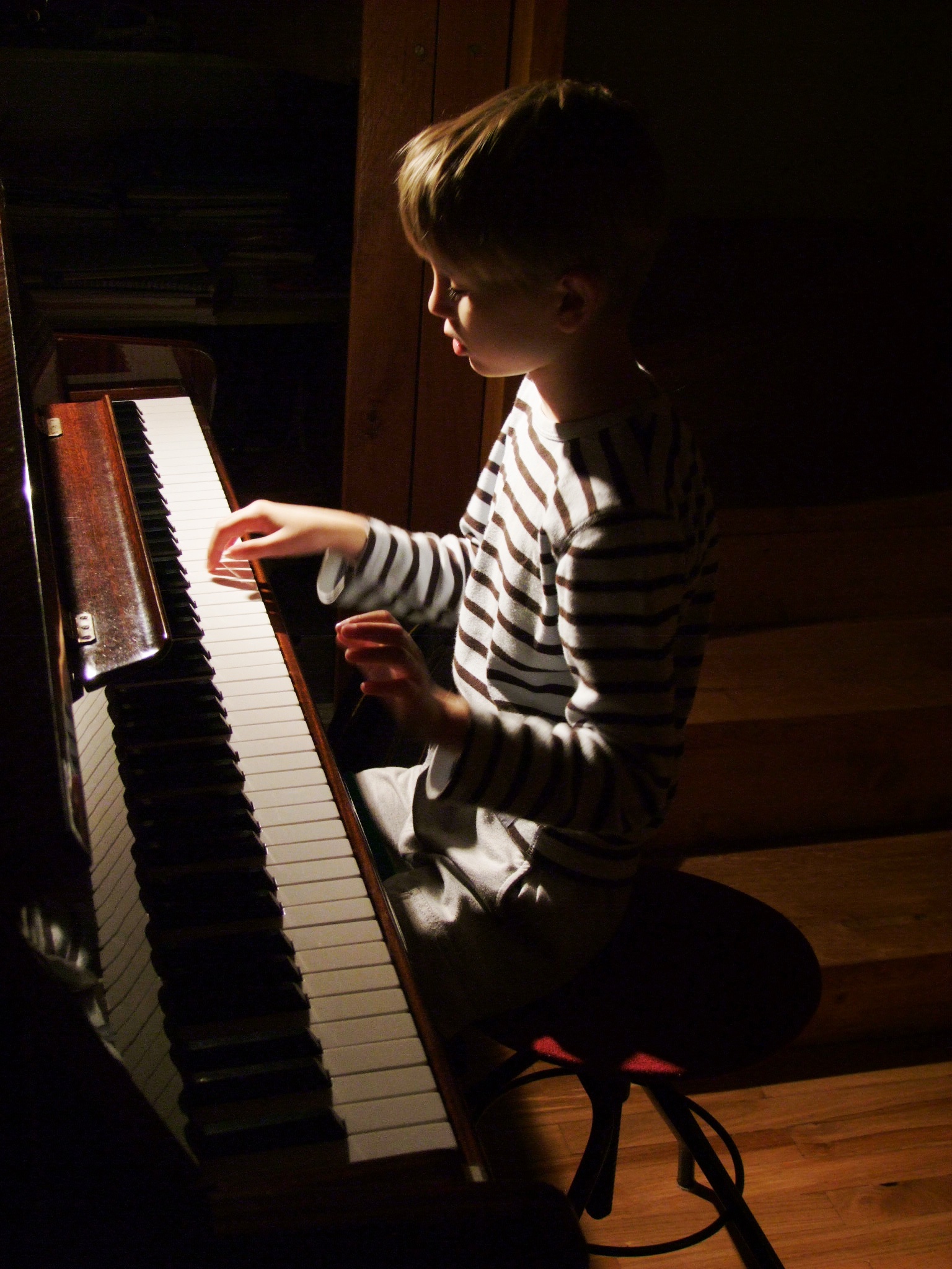 Child playing the piano