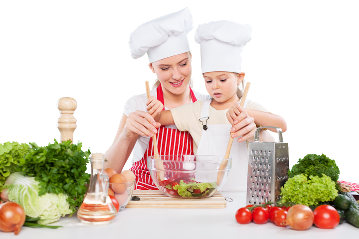 mother & daughter cooks in kitchen