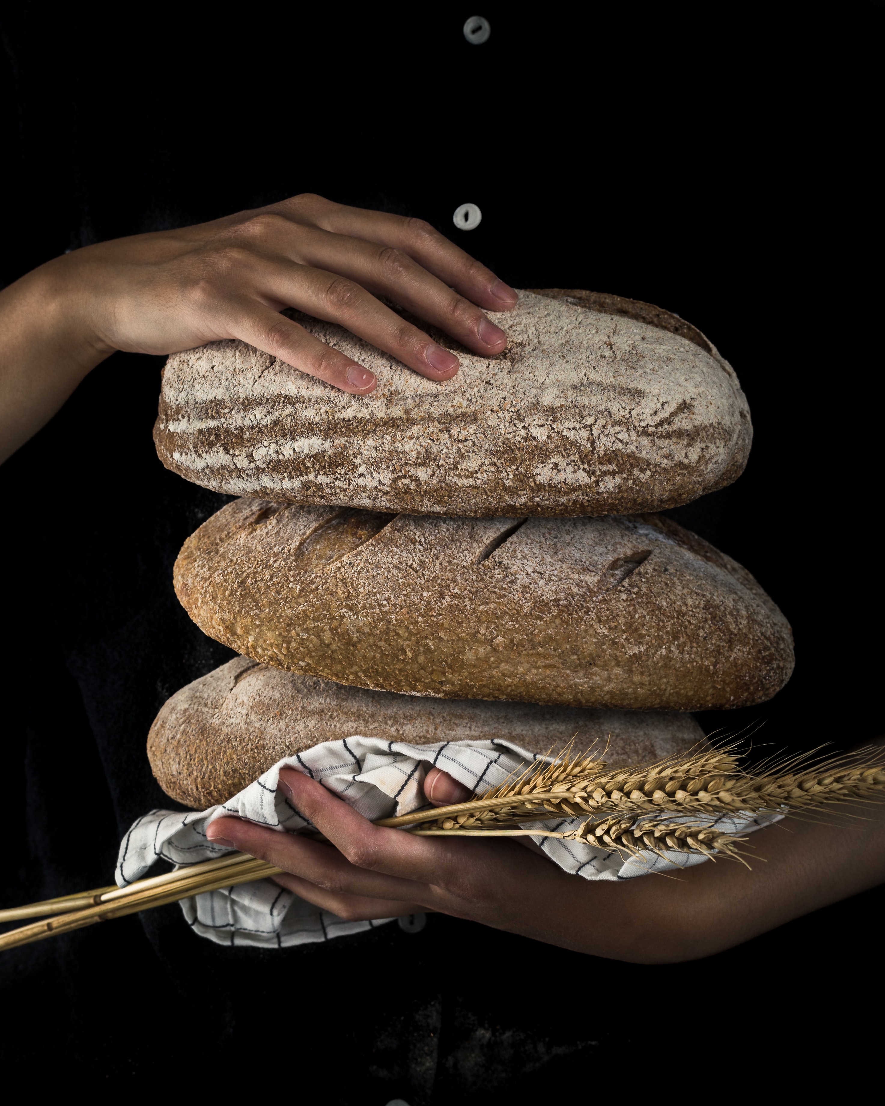 Carrying 3 loafs of bread