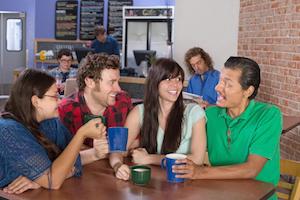 Friends socialzing in Café