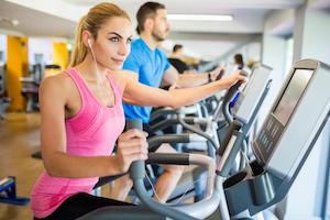 Fit blond woman on step machine language learning