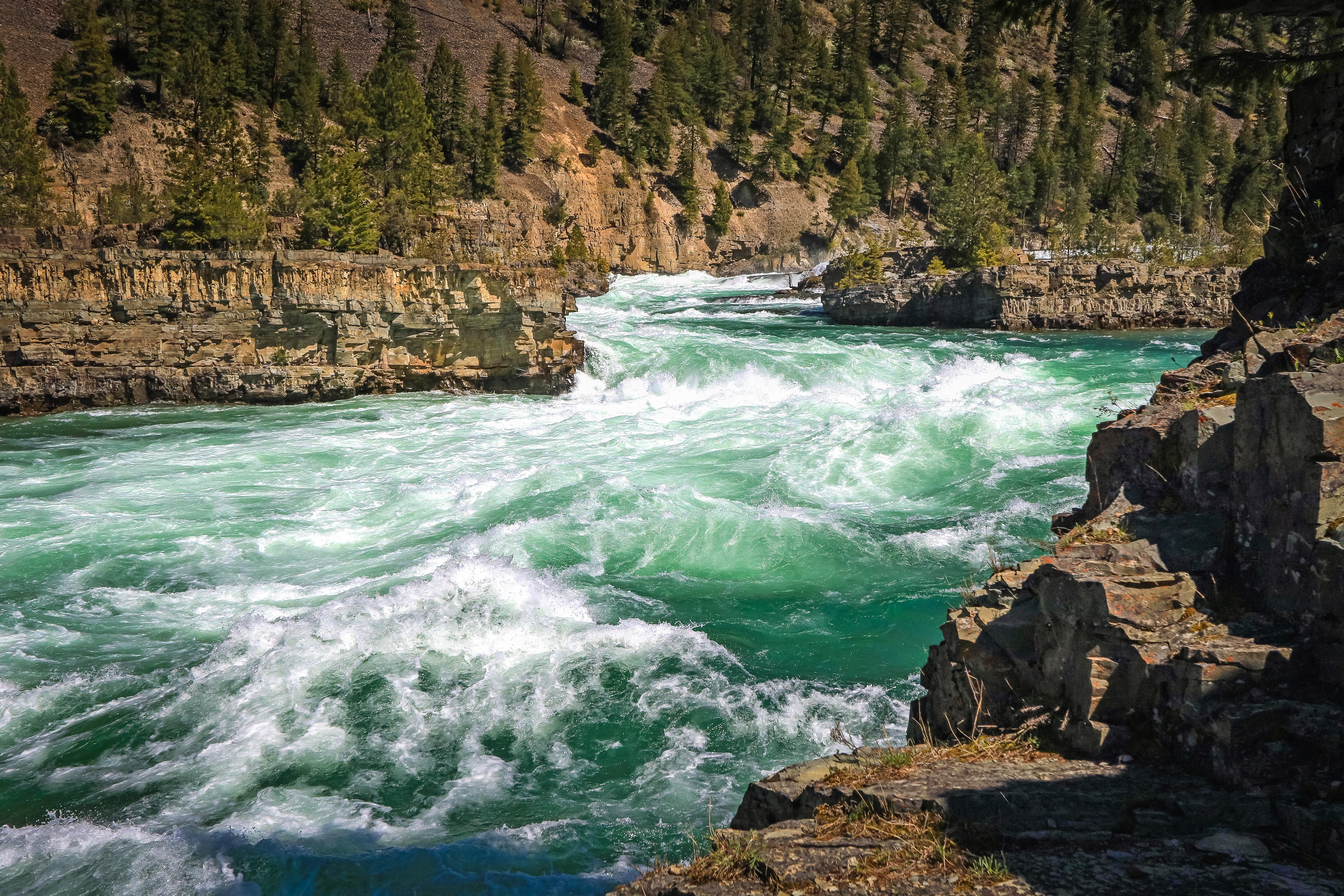 Flowing river by tim-peters-on-unsplash
