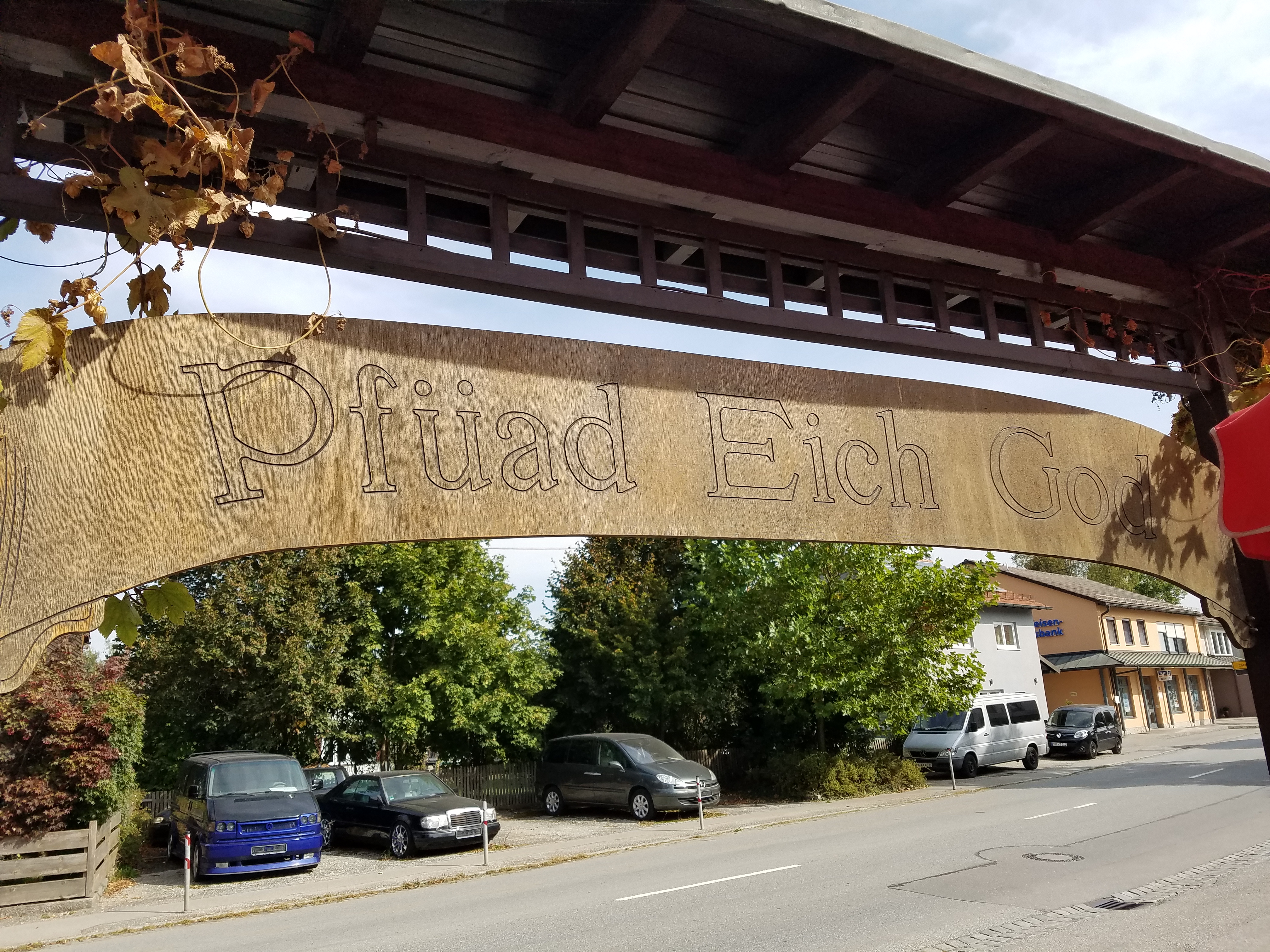 Beer Garden sign: "Pfüad Eich God"