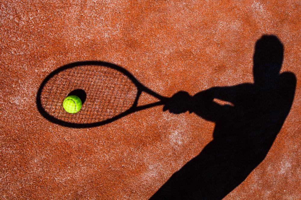 shadow of tennis player