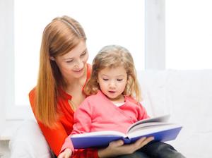 Language learning child with mother